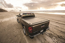 Load image into Gallery viewer, Roll-N-Lock Chevy Silverado/Sierra 2500/3500 SB 77-3/8in A-Series Retractable Tonneau Cover