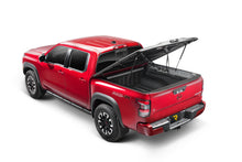 Load image into Gallery viewer, UnderCover Nissan Frontier 5ft Elite Bed Cover - Black Textured