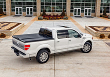 Load image into Gallery viewer, UnderCover Ford F-250/F-350 6.8ft Elite Bed Cover - Black Textured