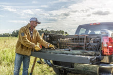 Load image into Gallery viewer, Roll-N-Lock Chevy Silverado/Sierra w/ OE Rail Caps SB 77-3/4in Cargo Manager