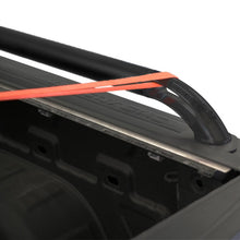 Load image into Gallery viewer, Close-up of the black powder-coated Putco locker side rails installed on a Hyundai Santa Cruz