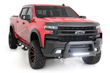 Load image into Gallery viewer, Red Chevrolet Silverado 1500 featuring Lund Revolution Bull Bar, front angle view