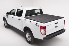 Load image into Gallery viewer, Extang 15-20 Nissan NP300 Navara DC 1469mm (4ft 10in) Solid Fold 2.0