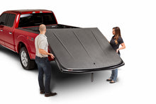 Load image into Gallery viewer, UnderCover Ford F-150 5.5ft SE Bed Cover - Black Textured