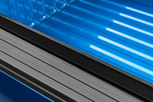 Load image into Gallery viewer, Close-up of a component resembling a blue refrigerator with a black handle, possibly misidentified