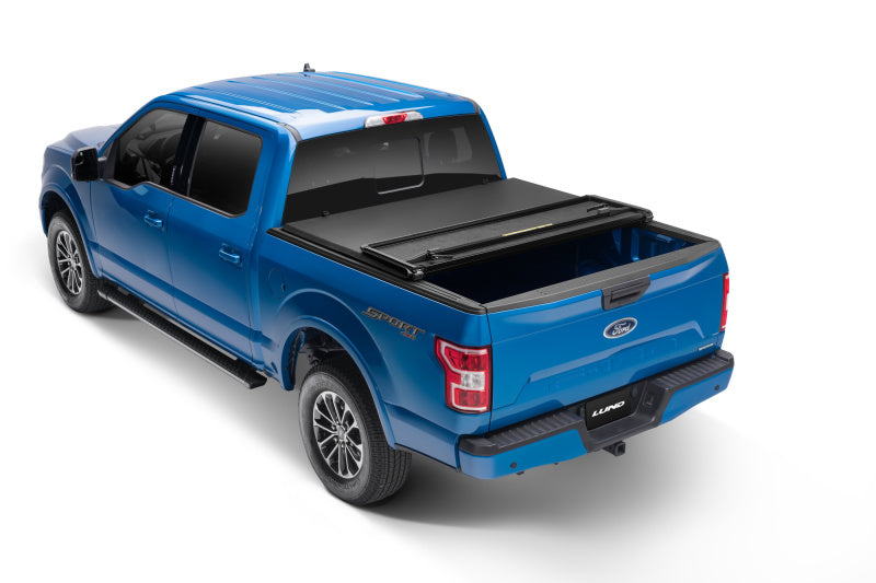 Lund Dodge Ram 1500 Fleetside (6.4ft. Bed) Hard Fold Tonneau Cover - Black