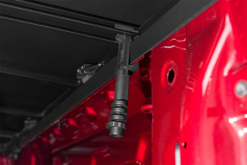 Lund RAM 1500 (5.5ft Bed w/o RamBox Cargo Mgmt) Genesis Tri-Fold Tonneau Cover - Black